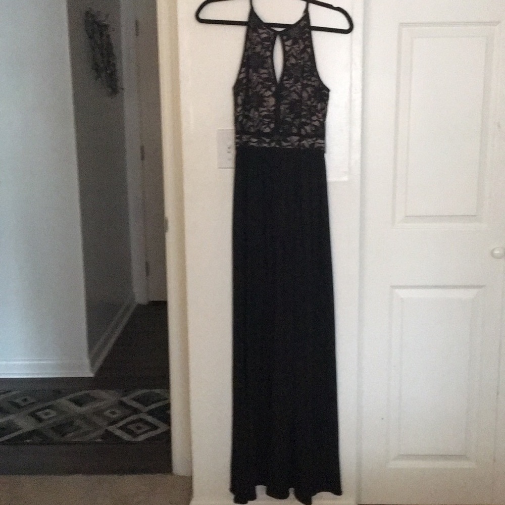 Never worn, doesn’t fit.